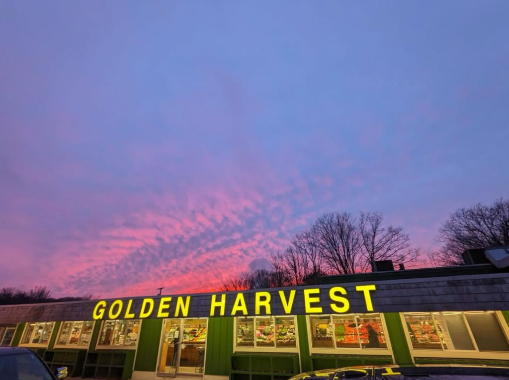 Golden Harvest Produce Market storefront at sunset in Kittery, Maine